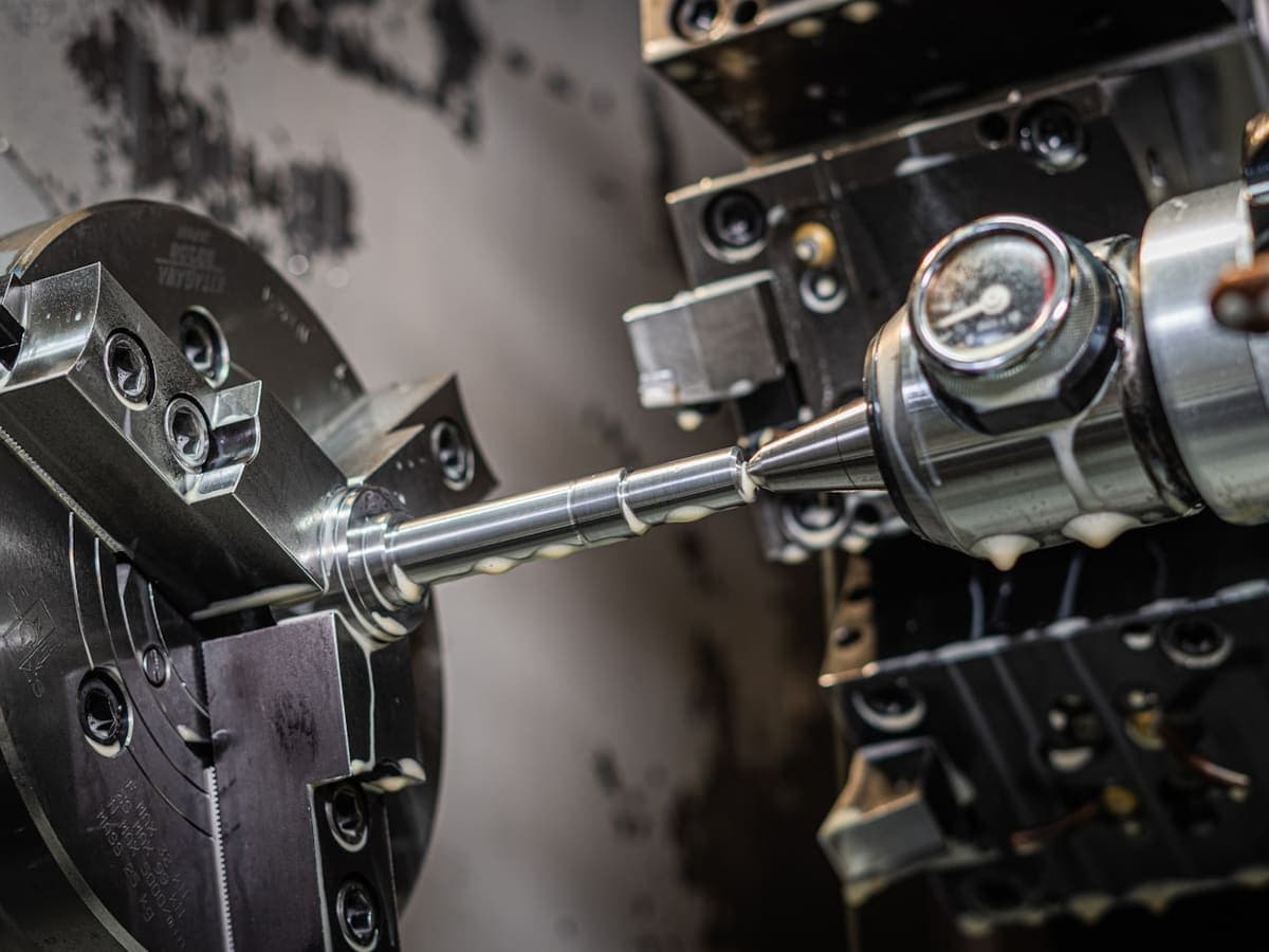 Turning a precision metal component